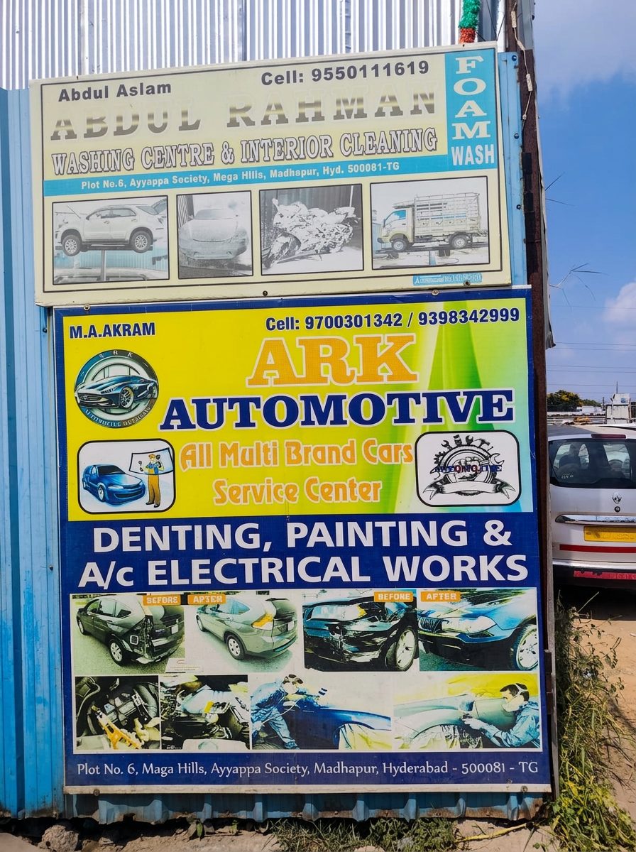 Service signboards outside our garage in Madhapur, Hyderabad
